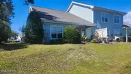 125 Willow Pond Drive, Morehead City, NC 28557 — 2-bedroom townhome in The Landings, Morehead City, NC, photo 3 of 5: Willow Rear