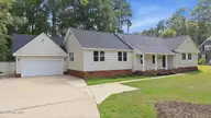 1209 Waterloo Drive, Rocky Mount, NC 27804 — 4-bedroom home in Northgreen Village, Rocky Mount, NC, photo 1 of 42: 4-web-or-mls-DJI_20260831153048_0375_D