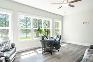 613 Watauga Lane, Aberdeen, NC 28315 — 4-bedroom home in Legacy Lakes, Aberdeen, NC, photo 10 of 48: Living Room Windows