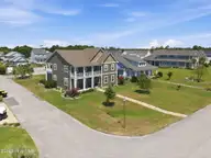 208 Bogue Harbor Court, Newport, NC 28570 — 5-bedroom waterfront home in Bogue Watch, Newport, NC, photo 7 of 70: 22-web-or-mls-DJI_20260703113827_0418_D_