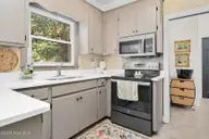 113 Edinborough Court, Rocky Mount, NC 27803 — 4-bedroom home in Spencer Woods, Rocky Mount, NC, photo 14 of 32: Granite Kitchen Counters