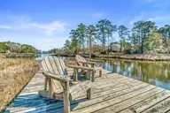 266 Ennett Lane, Sneads Ferry, NC 28460 — 3-bedroom waterfront home, Sneads Ferry, NC, photo 17 of 37: Deck Overlooking Creek