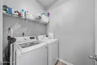 803 Lenox Drive, Holly Ridge, NC 28445 — 4-bedroom home in The Preserve At Morris Landing, Holly Ridge, NC, photo 16 of 44: 19_laundry