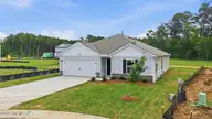 3607 Huntsmoor Lane NW, Wilson, NC 27896 — 3-bedroom home in Jetstream Park, Wilson, NC, photo 3 of 36: 3-custom-DJI_20260630121710_0821_D_1