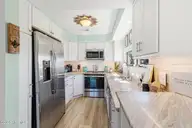 545 Salter Path Road L7, Pine Knoll Shores, NC 28512 — 4-bedroom waterfront condo in Beacon's Reach, Pine Knoll Shores, NC, photo 4 of 43: Kitchen