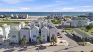 107 W Bogue Boulevard 3, Atlantic Beach, NC 28512 — 2-bedroom home in The Lookouts in The Grove, Atlantic Beach, NC, photo 3 of 38: 12-web-or-mls-DJI_20260908165200_0028_D