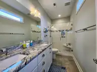 111 Blockade Runner Drive, Holden Beach, NC 28462 — 4-bedroom home, Holden Beach, NC, photo 19 of 54: Primary Bathroom