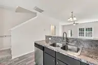 131 Beacon Woods Drive, Holly Ridge, NC 28445 — 2-bedroom townhome in The Townes At Holly Ridge, Holly Ridge, NC, photo 9 of 38: Kitchen