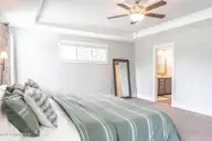 357 Wheatfield Way, Whispering Pines, NC 28327 — 5-bedroom home in Summerfield at Arrowstone, Whispering Pines, NC, photo 24 of 44: Primary Suite w/ Trey Ceilings