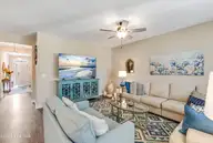 1728 Culdees Lane SE, Bolivia, NC 28422 — 3-bedroom home in Avalon, Bolivia, NC, photo 21 of 57: living room towards entry way