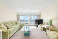 331 Salter Path Road 311, Pine Knoll Shores, NC 28512 — 3-bedroom waterfront condo in Beachwalk, Pine Knoll Shores, NC, photo 11 of 55: Great room