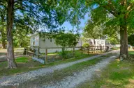 215 Anderson Drive, Hampstead, NC 28443 — 2-bedroom manufactured home in Virginia Creek Sub-Division, Hampstead, NC, photo 1 of 32