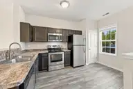 131 Beacon Woods Drive, Holly Ridge, NC 28445 — 2-bedroom townhome in The Townes At Holly Ridge, Holly Ridge, NC, photo 4 of 38: Kitchen