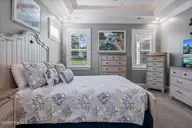 141 Clubhouse Road, Sunset Beach, NC 28468 — 4-bedroom home in Sea Trail Plantation, Sunset Beach, NC, photo 21 of 59: Master Bedroom