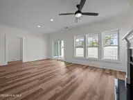 128 Pine View Boulevard, Beaufort, NC 28516 — 3-bedroom home in Beau Coast West, Beaufort, NC, photo 6 of 37: Living with Gas Fireplace