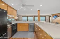 111 Dogwood Circle, Pine Knoll Shores, NC 28512 — 4-bedroom waterfront home in Pine Knoll Association, Pine Knoll Shores, NC, photo 6 of 52: Kitchen with ocean views