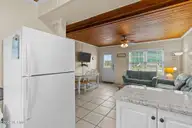 103 24th Street, Emerald Isle, NC 28594 — 4-bedroom townhome in Emerald Isle By The Sea, Emerald Isle, NC, photo 8 of 51: Kitchen & Living Area