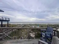 832 Fort Fisher Boulevard N, Kure Beach, NC 28449 — 4-bedroom waterfront home in Hanby Beach, Kure Beach, NC, photo 5 of 5: Elevated Back Deck