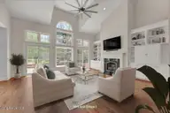 2006 Kenilworth Lane, Wilmington, NC 28405 — 3-bedroom waterfront home in Landfall, Wilmington, NC, photo 19 of 68: 2006 Kenilworth great room #1 - staged