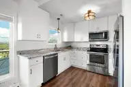 1819 Salter Path Road, Indian Beach, NC 28512 — 5-bedroom waterfront home in Roosevelt Estate, Indian Beach, NC, photo 7 of 58: Updated kitchen