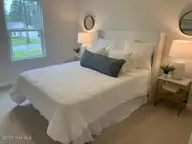 881 Plymouth Road, Boiling Spring Lakes, NC 28461 — 4-bedroom home in The Highlands at Boiling Spring Lakes, Boiling Spring Lakes, NC, photo 7 of 24: Clover Bedroom