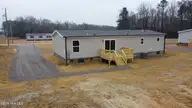 7584 Alice Court, Castalia, NC 27816 — 3-bedroom manufactured home in Culpepper Landing, Castalia, NC, photo 8 of 45: DJI_0890