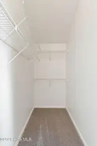 811 Grathwol Drive, Wilmington, NC 28405 — 3-bedroom home in Deerbrook Patio Homes, Wilmington, NC, photo 23 of 41: Primary Closet