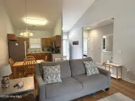 5069 Wyncie Wynd, Southport, NC 28461 — 2-bedroom condo in South Harbour Village, Southport, NC, photo 5 of 24: Living room