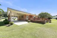 519 Edwards Road, Jacksonville, NC 28540 — 2-bedroom home, Jacksonville, NC, photo 7 of 58: Back View/Carport
