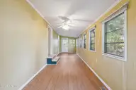 630 Dogwood Drive, Sunset Beach, NC 28468 — 3-bedroom manufactured home in Seaside Station, Sunset Beach, NC, photo 24 of 36: Carolina Room