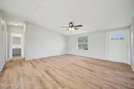 222 Katies Trail, Elizabeth City, NC 27909 — 3-bedroom manufactured home in Tuckers Ridge, Elizabeth City, NC, photo 10 of 32: living room