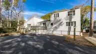 246 Oakleaf Drive, Pine Knoll Shores, NC 28512 — 5-bedroom waterfront home in Crosby Cove, Pine Knoll Shores, NC, photo 1 of 77: 1-custom-chadwick-visuals-246-oakleaf-dr