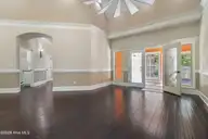 1614 Colonist Square SW, Ocean Isle Beach, NC 28469 — 3-bedroom home in Brick Landing, Ocean Isle Beach, NC, photo 8 of 63: Foyer to formal LR
