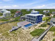 7519 Ocean Drive, Emerald Isle, NC 28594 — 9-bedroom waterfront home in Surfside, Emerald Isle, NC, photo 7 of 75: 7519 Ocean Drive