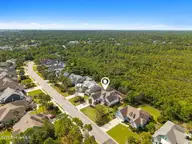 2825 Pine Forest Drive, Southport, NC 28461 — 4-bedroom home in St James, Southport, NC, photo 2 of 75: Pine Forest_Drone Nature