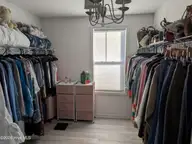 114 Lumis Court, Hampstead, NC 28443 — 4-bedroom home in Dogwood Lakes, Hampstead, NC, photo 18 of 26: Huge Primary closet