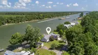 1074 Sea Gate Drive, Newport, NC 28570 — 3-bedroom waterfront home in Sea Gate, Newport, NC, photo 12 of 59: Aerial