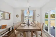 1271 Rippling Cove Loop SW, Supply, NC 28462 — 3-bedroom waterfront home in Stanbury Creek, Supply, NC, photo 11 of 53: Dining