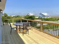 323 Caswell Beach Road, Oak Island, NC 28465 — 5-bedroom waterfront home in Caswell Beach, Oak Island, NC, photo 2 of 54: 323 Caswell Beach