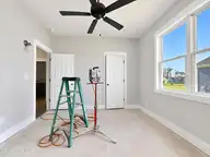 462 Pointe Vista Drive, Elizabeth City, NC 27909 — 3-bedroom waterfront home in The Waters At Sunset Pointe, Elizabeth City, NC, photo 12 of 19: Bedroom 3