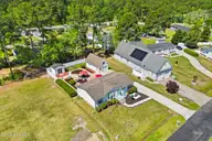 836 Nicholas Drive SW, Calabash, NC 28467 — 3-bedroom manufactured home in Village At Calabash, Calabash, NC, photo 5 of 61: 54_dji_0749