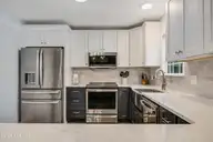 1803 W Yacht Drive, Oak Island, NC 28465 — 3-bedroom home in Pinners Point, Oak Island, NC, photo 12 of 39: Kitchen