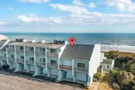 535 Salter Path Road Unit 2, Pine Knoll Shores, NC 28512 — 2-bedroom waterfront condo in Beacon's Reach, Pine Knoll Shores, NC, photo 1 of 57: Coral Shores Unit 2