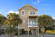 615 N New River Drive Apt D, Surf City, NC 28445 — 3-bedroom waterfront townhome in Hammock Cove Townhouses, Surf City, NC, photo 1 of 47: 1-web-or-mls-01