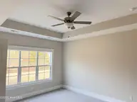 112 Flat Clam Drive, Wilmington, NC 28401 — 3-bedroom home in Riverside Cove, Wilmington, NC, photo 18 of 23: Owners Bedroom