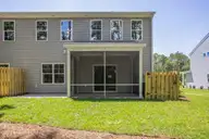 304 Lusterleaf Lane #2, Shallotte, NC 28470 — 3-bedroom townhome in Rourk Woods, Shallotte, NC, photo 2 of 29: back.2