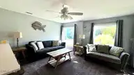 9201 Coast Guard Road E-101, Emerald Isle, NC 28594 — 3-bedroom waterfront condo in Pebble Beach, Emerald Isle, NC, photo 22 of 50: 2 comfy couches