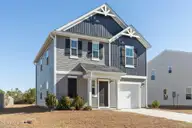 209 New Home Place, Holly Ridge, NC 28445 — 3-bedroom home in The Home Place, Holly Ridge, NC, photo 3 of 39: Front of House