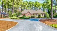 65 Abbottsford Drive, Pinehurst, NC 28374 — 3-bedroom home in Pinewild CC, Pinehurst, NC, photo 1 of 66: DJI_2904