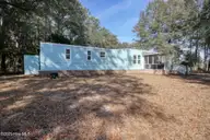 9161 Riveredge Place SW, Calabash, NC 28467 — 3-bedroom manufactured home in Bonaparte Retreat, Calabash, NC, photo 18 of 30: Side yard